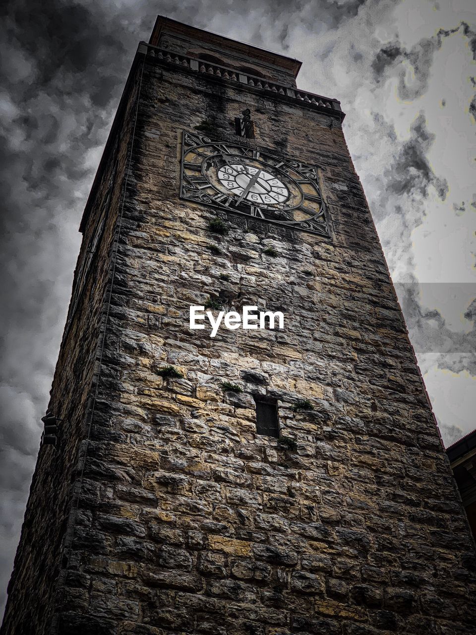 LOW ANGLE VIEW OF OLD TOWER AGAINST SKY