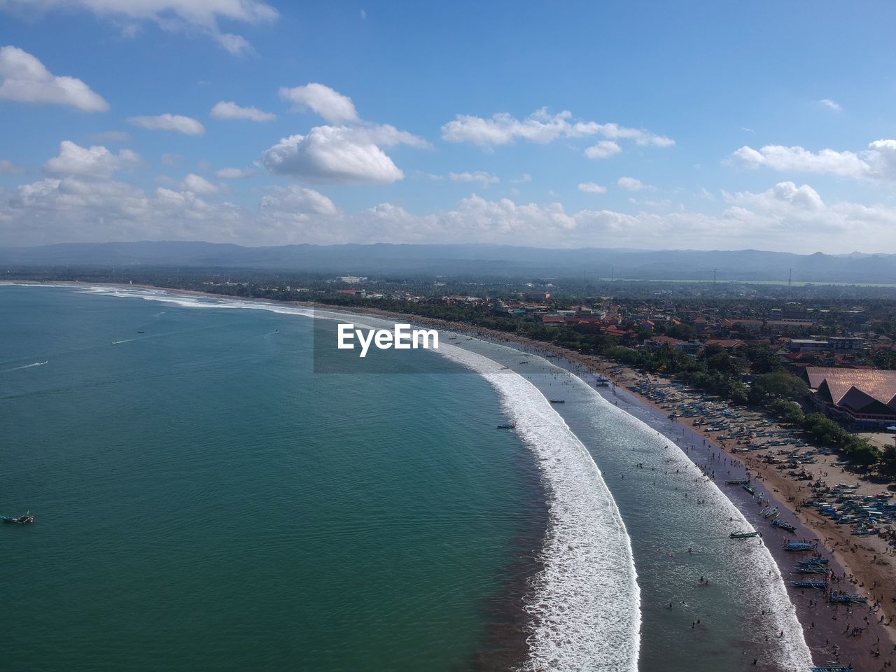 High angle view of beach against blue sky