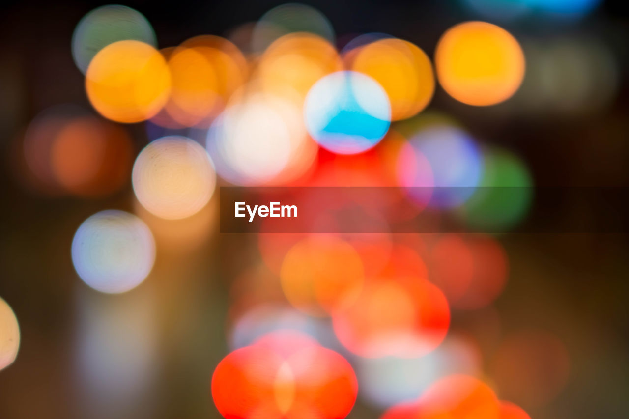 CLOSE-UP OF DEFOCUSED LIGHTS