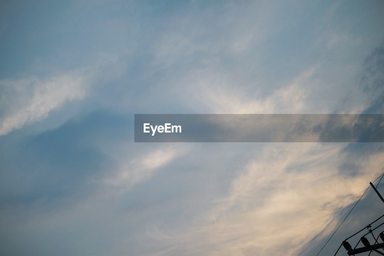 LOW ANGLE VIEW OF SKY OVER CLOUDS