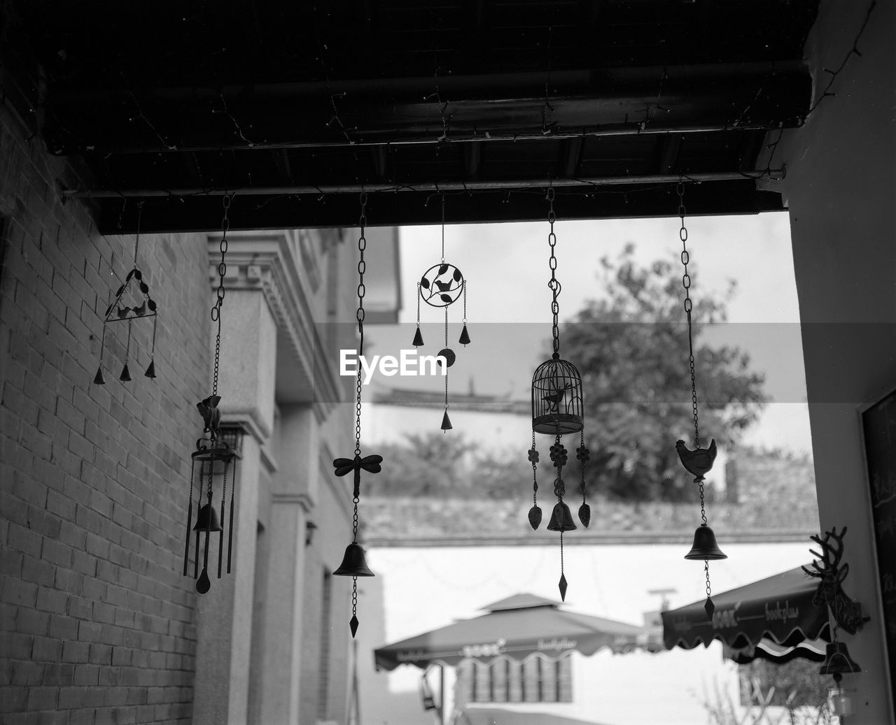 Low angle view of bells hanging in house