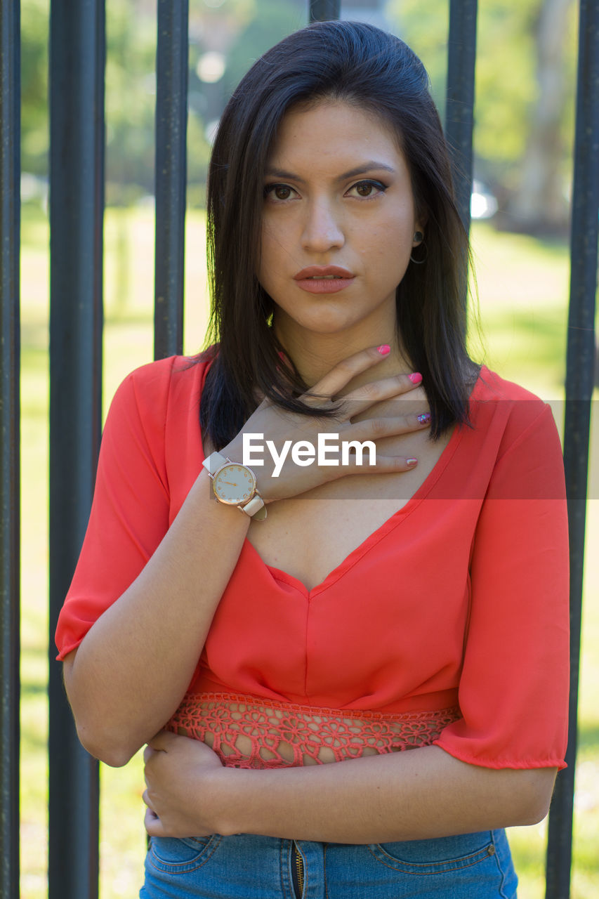 Model woman looking at camera during outdoors session