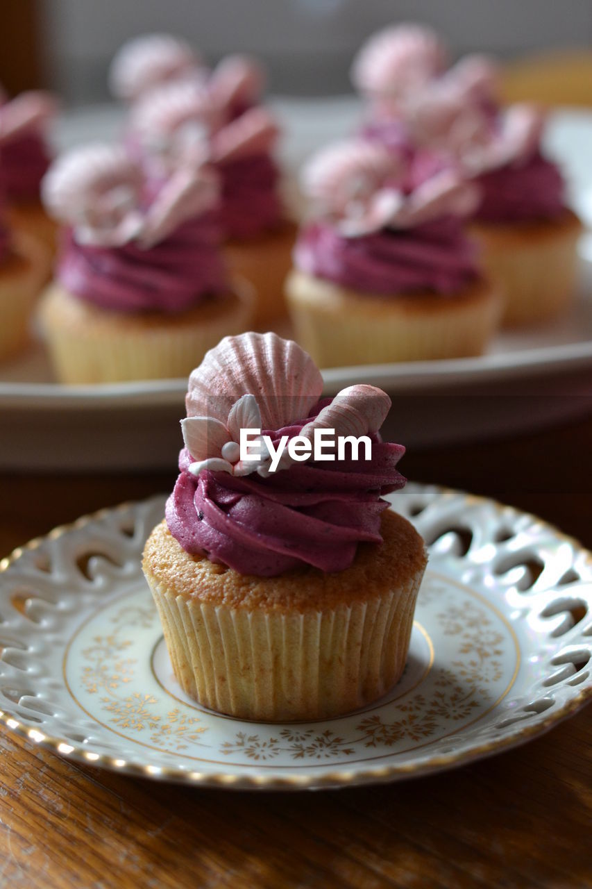 Close-up of cupcakes on plate