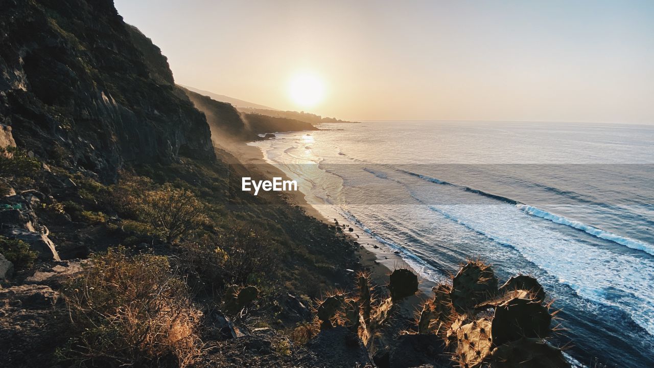 Scenic view of sea against sky during sunset