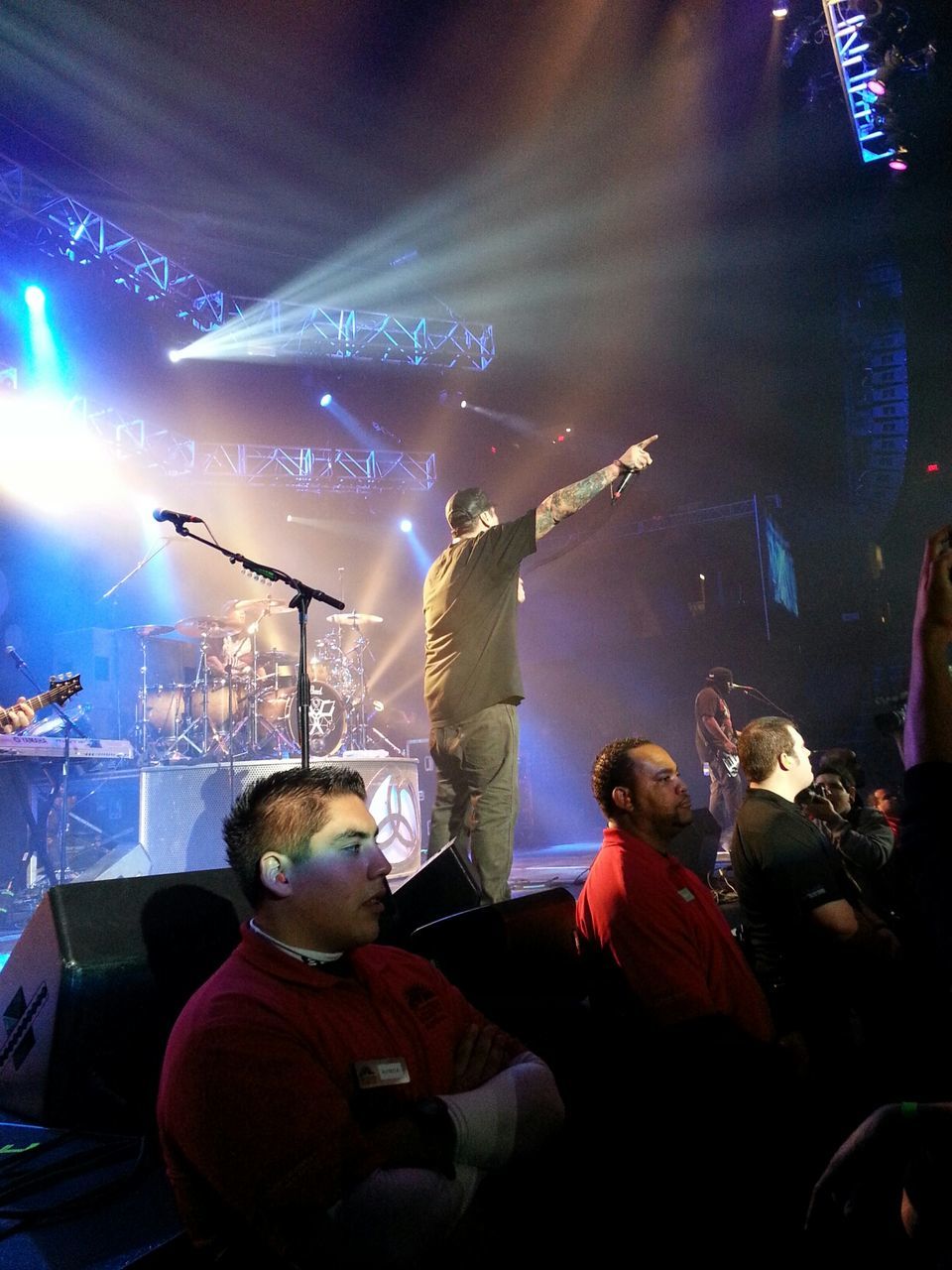 PEOPLE ENJOYING MUSIC CONCERT AT NIGHT