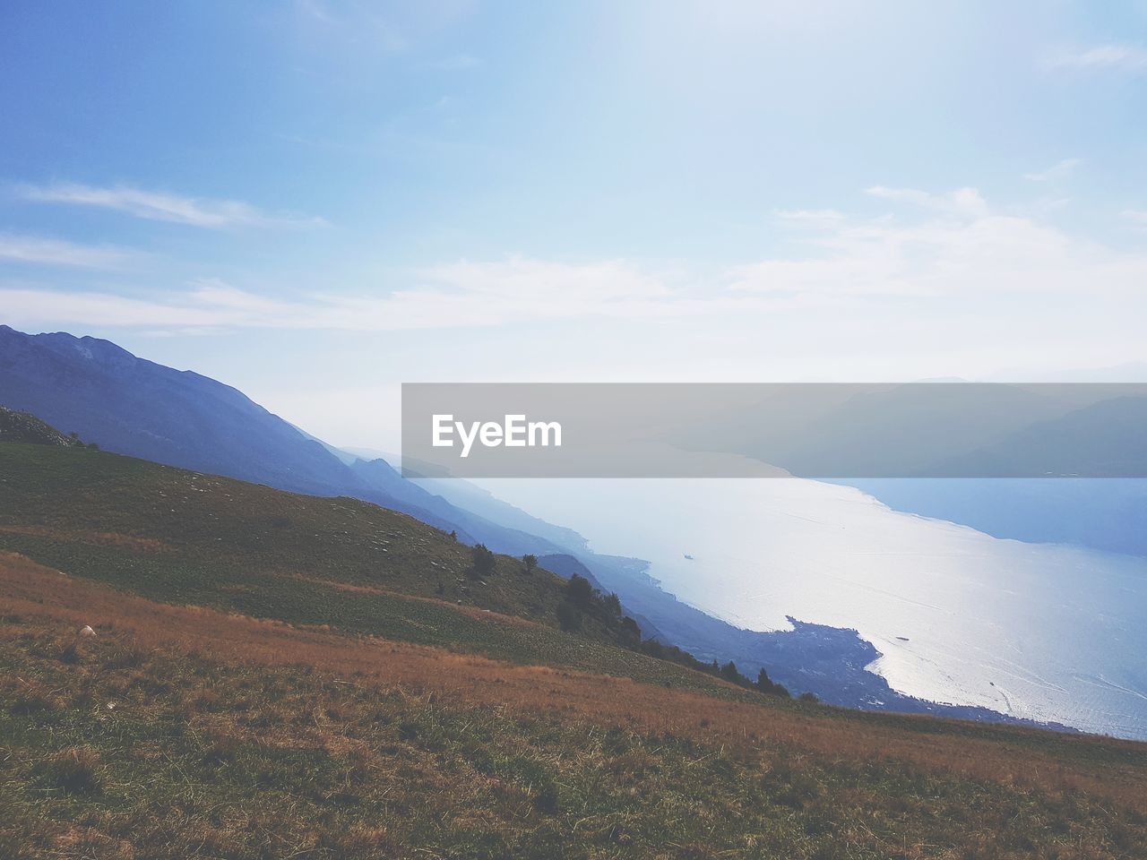 IDYLLIC SHOT OF LANDSCAPE AGAINST SKY