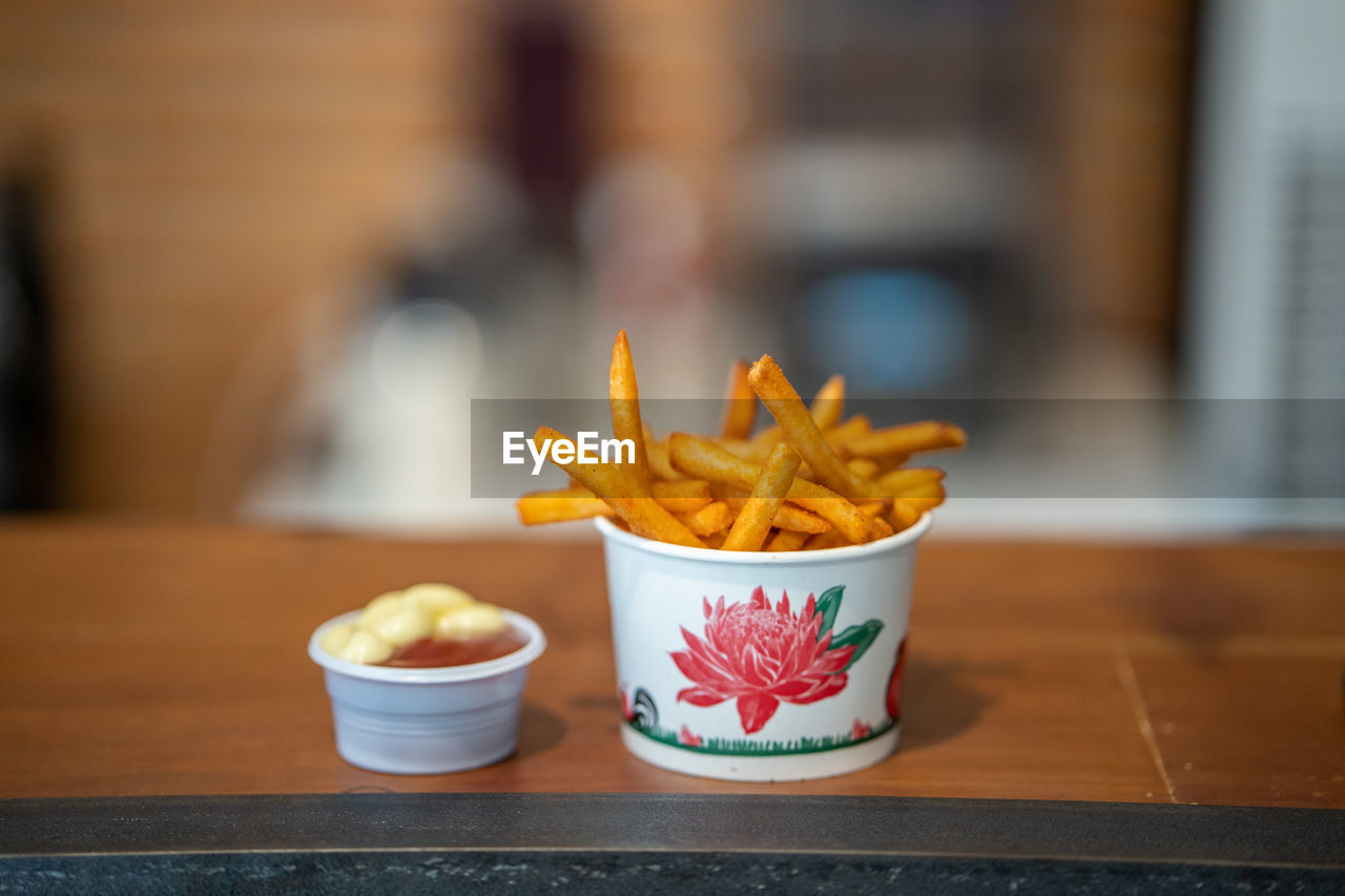 CLOSE-UP OF FOOD ON TABLE AT HOME