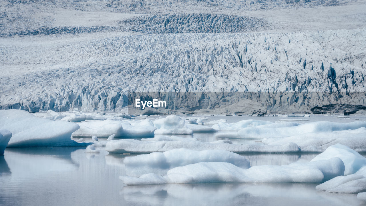 Abstract pattern view of floating icebergs at jökulsárlón glacier lagoon, vatnajökull, iceland