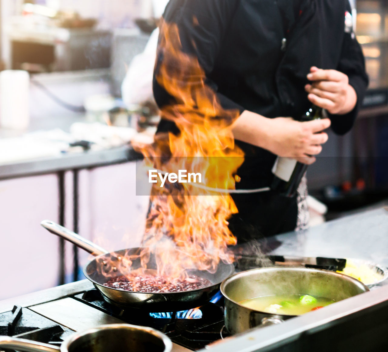 midsection of person preparing food