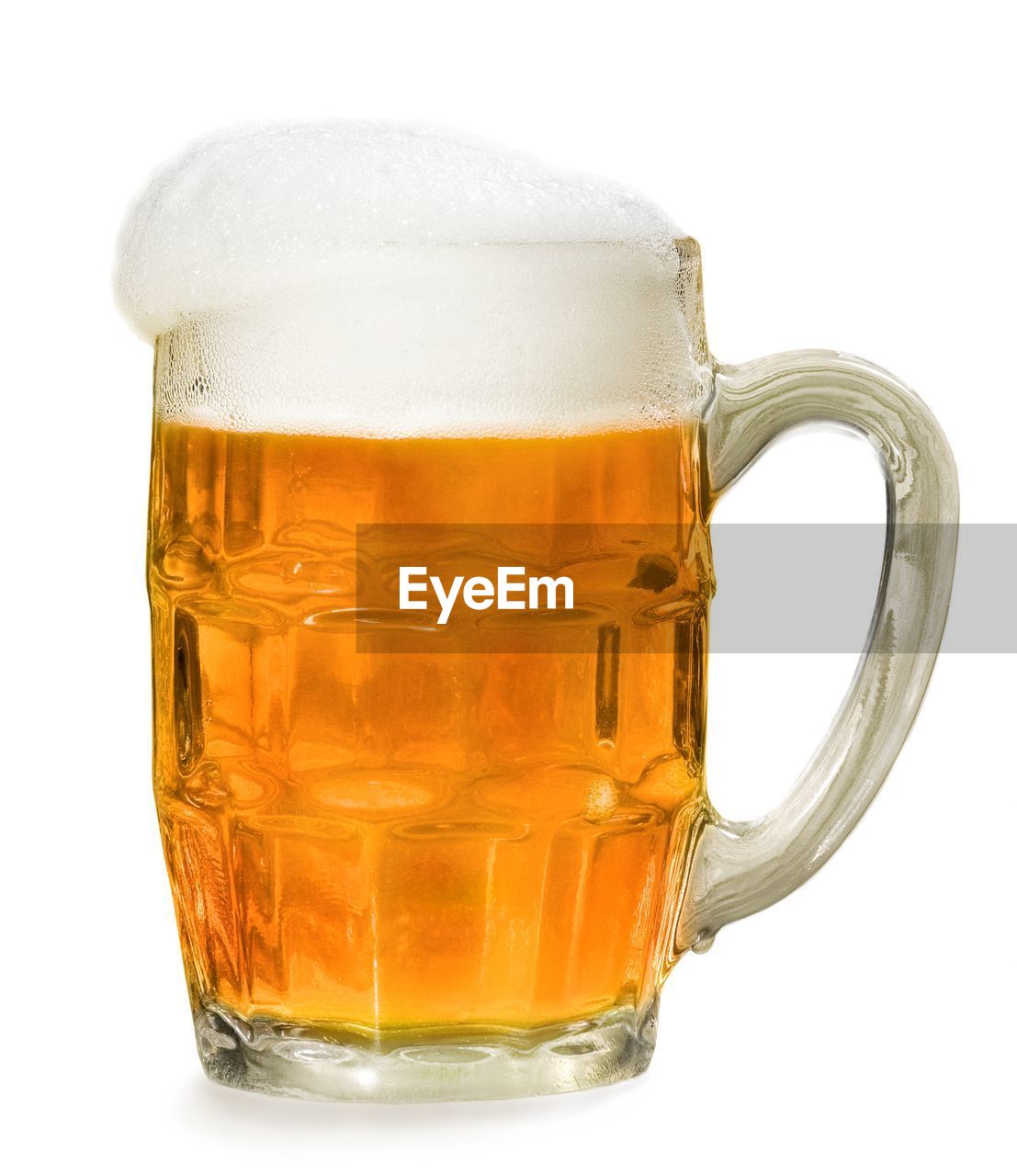 Close-up of beer in glass against white background