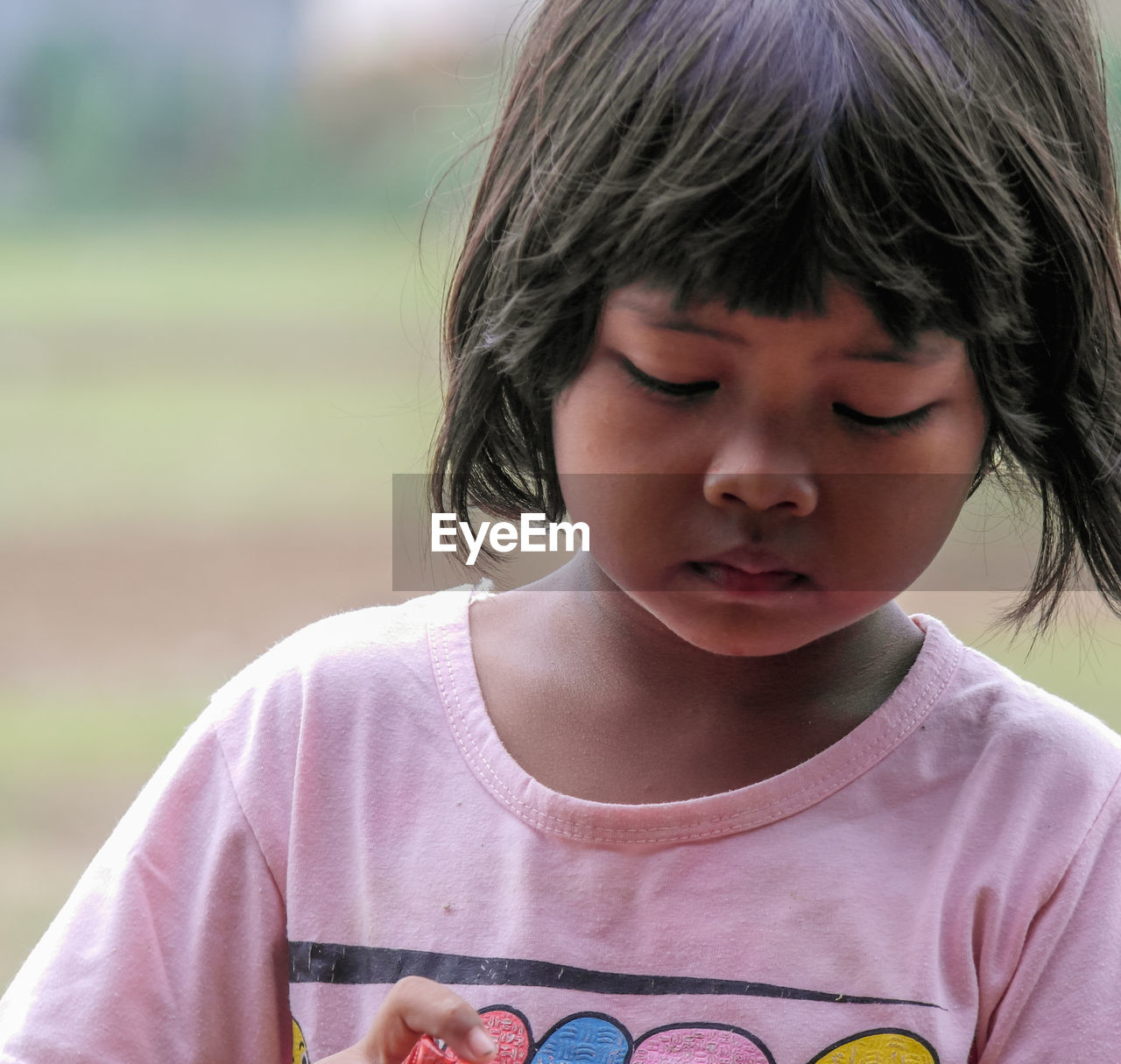 Close-up of girl looking away