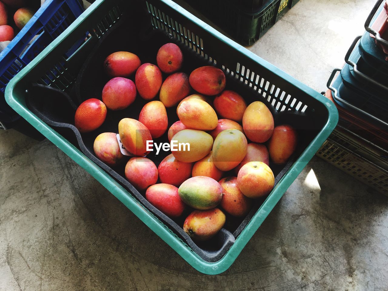 High angle view of fruits in basket at shop for sale