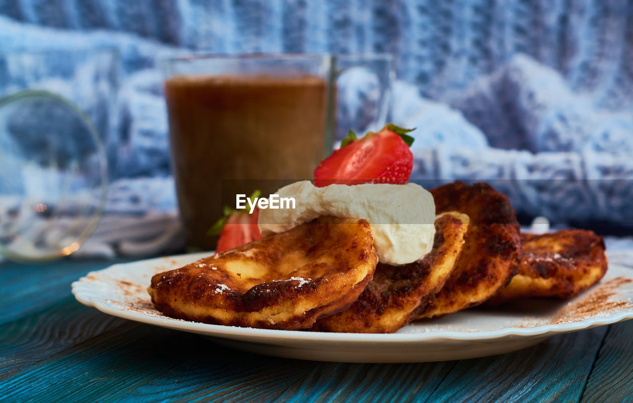 CLOSE-UP OF BREAKFAST ON TABLE IN PLATE