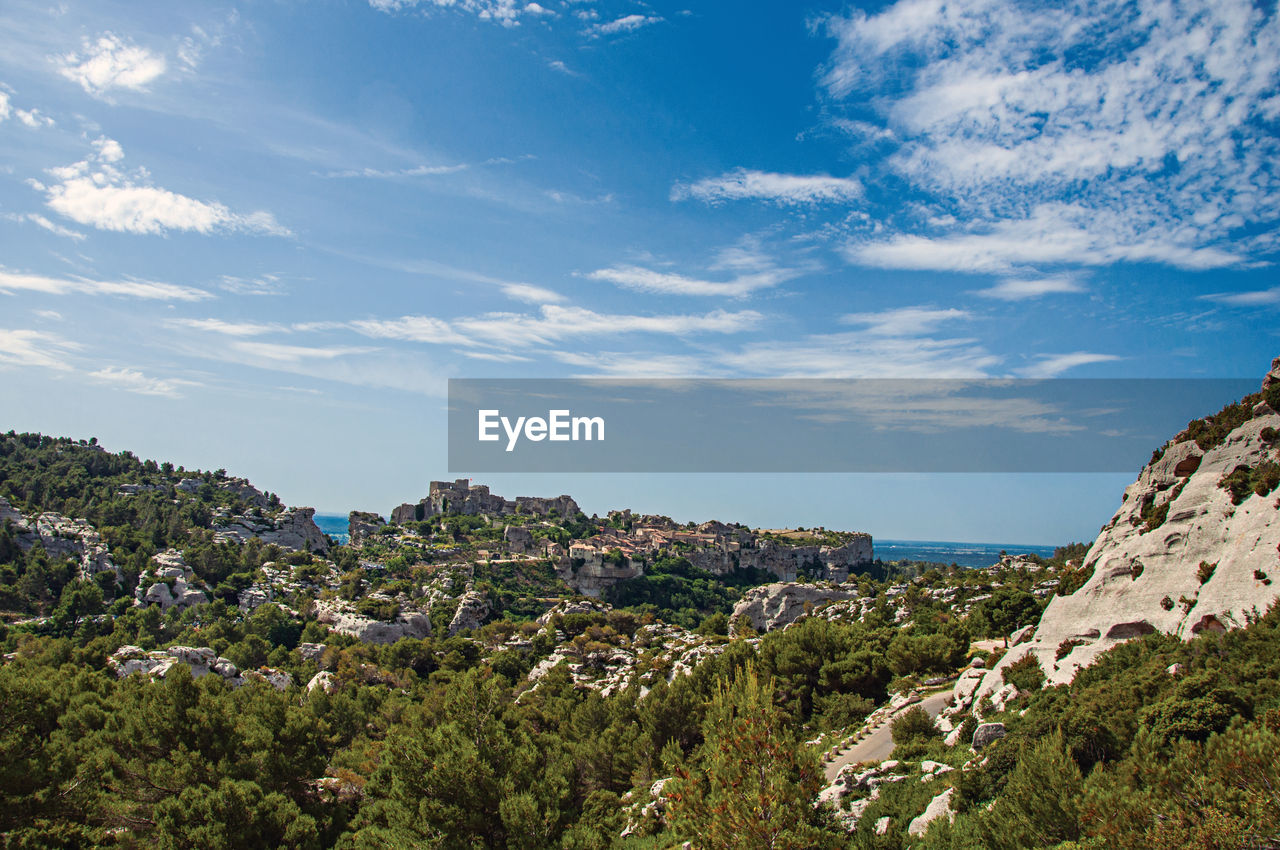 Panoramic view of the village and ruins of the baux-de-provence castle on top of cliff, france