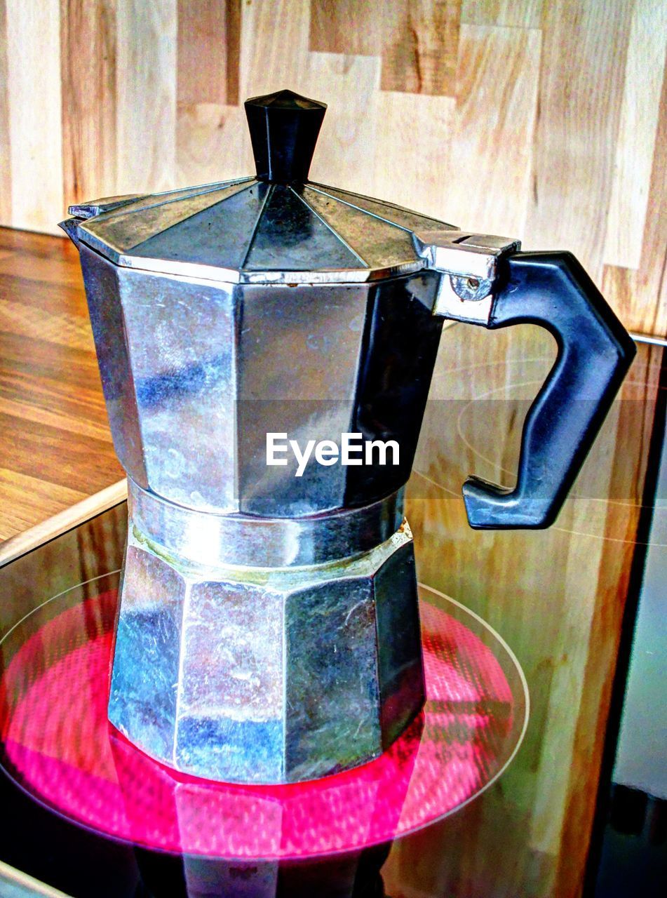 Close-up of old-fashioned espresso maker on table