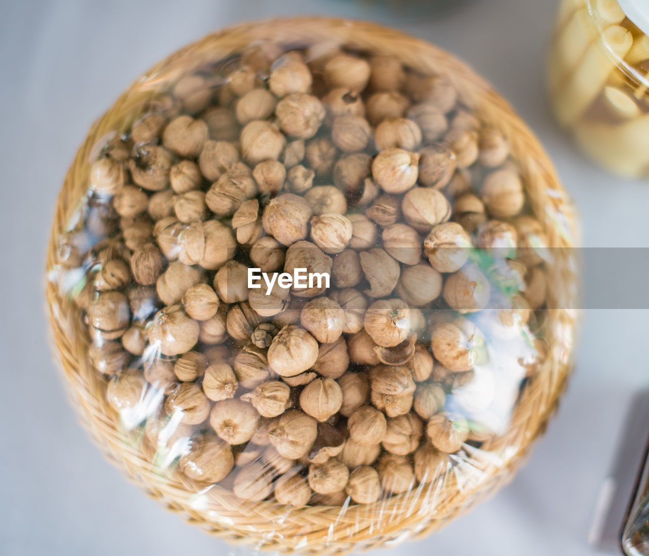 High angle view of hazelnut in packed container on table