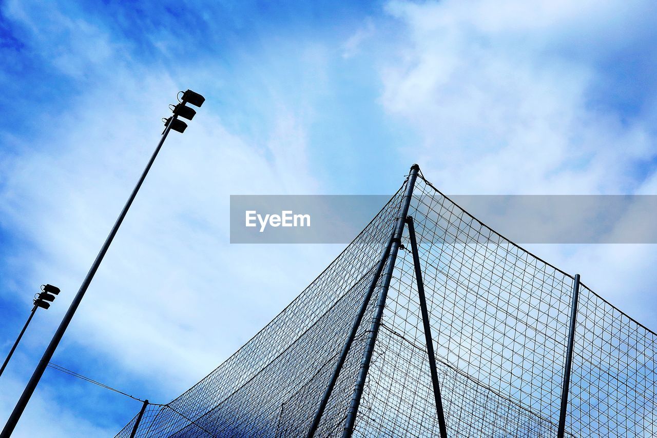 LOW ANGLE VIEW OF STREET LIGHT AGAINST SKY