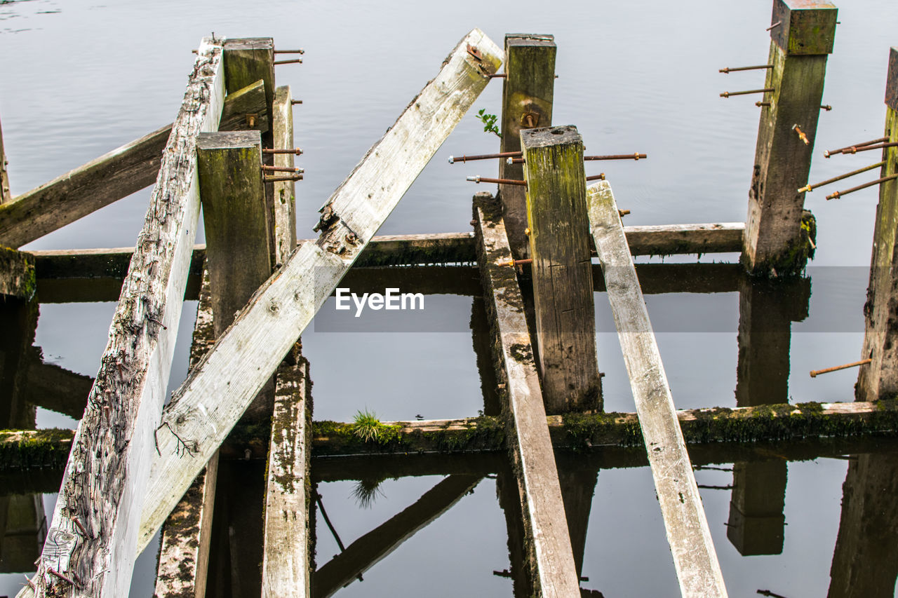 High angle view of old broken pier over river