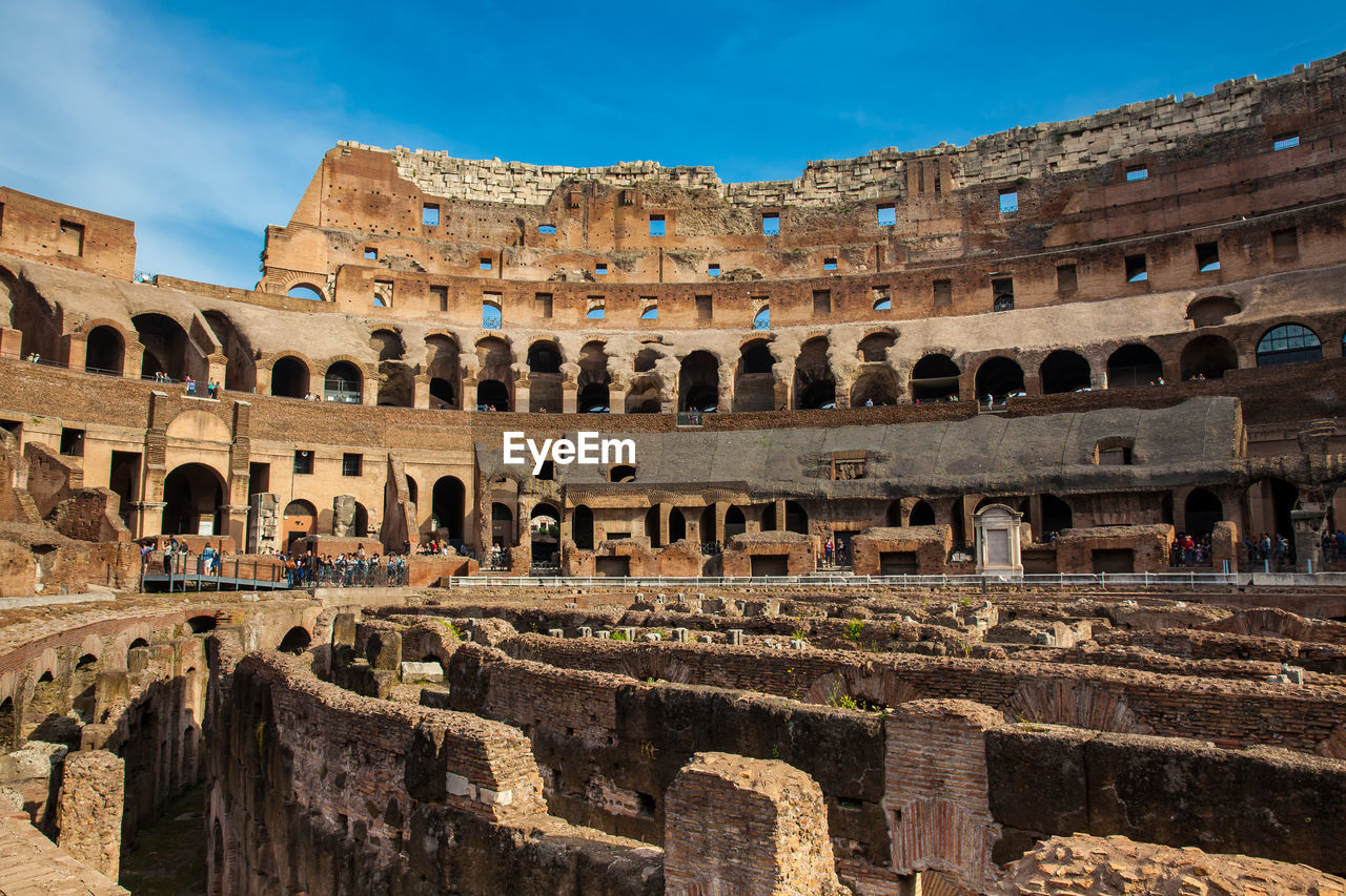 View of the seating areas and the hypogeum of the ancient colosseum in rome