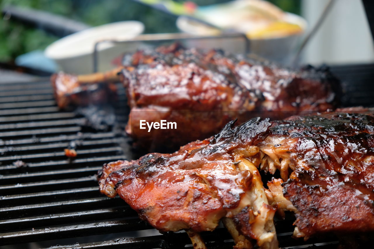 Close-up of meat on barbecue grill