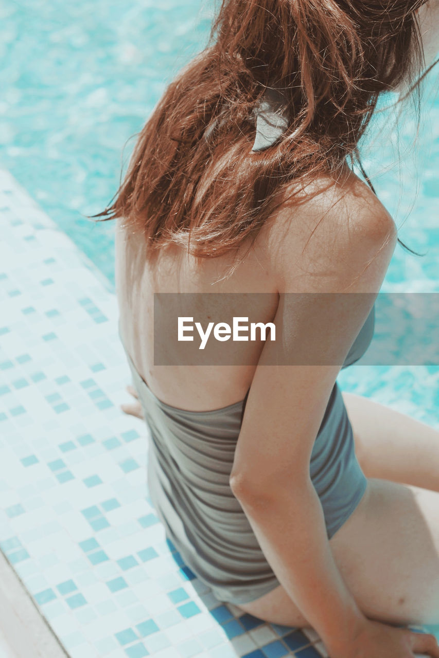 High angle view of woman in swimming pool