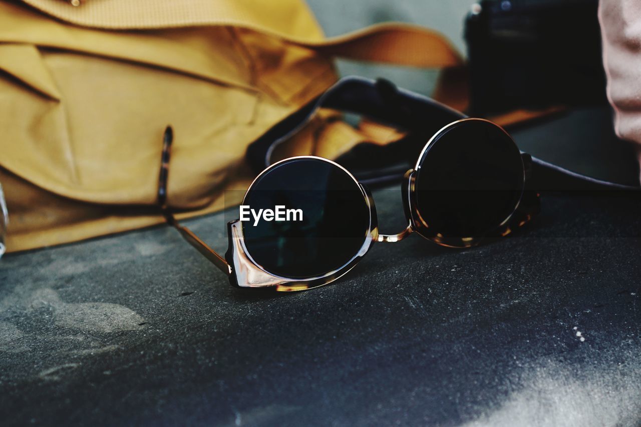 Close-up of sunglasses on table