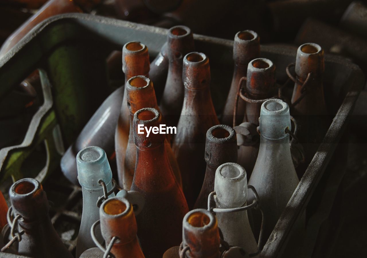 High angle view of empty beer bottles
