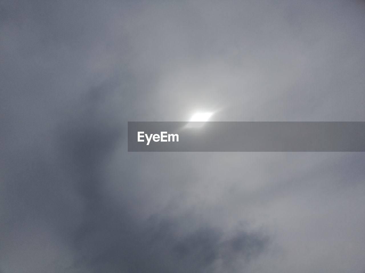 LOW ANGLE VIEW OF MOON AGAINST SKY AT NIGHT