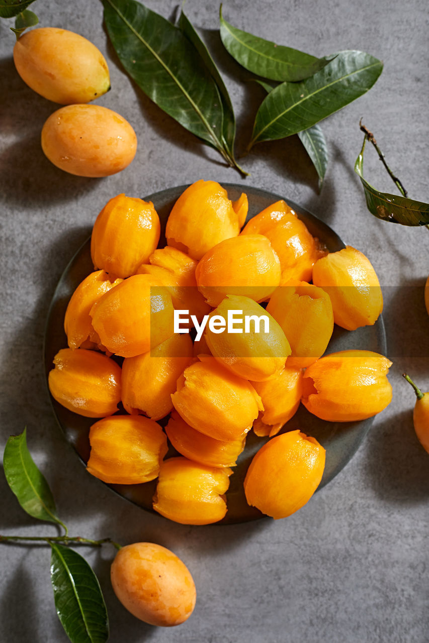 high angle view of fruits on wooden table