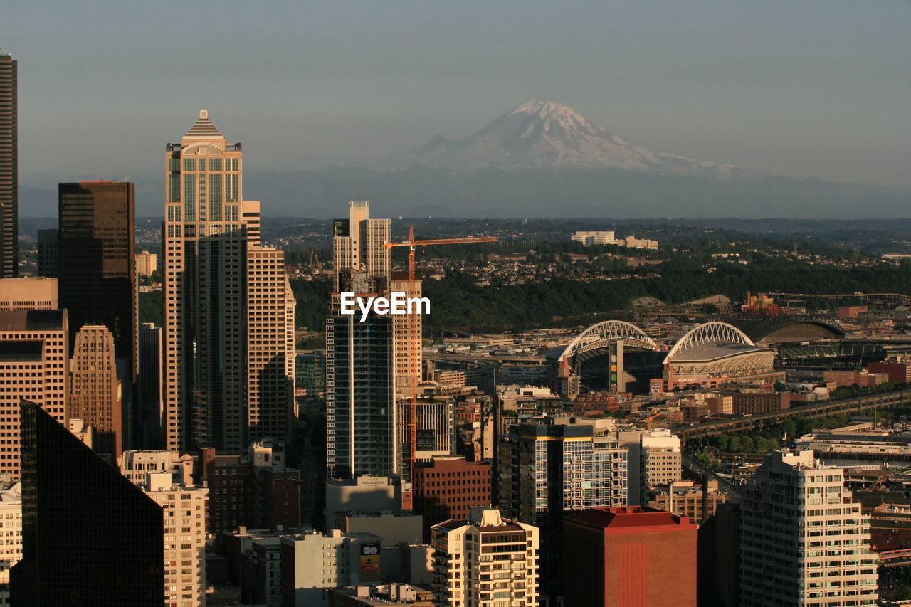 Seattle urban city skyline with rainer mountain at sunset, washington, usa. top view cityscape.