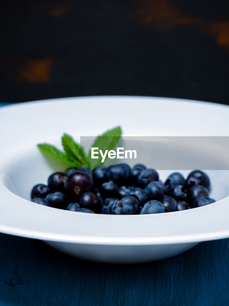 High angle view of fruits in plate on table