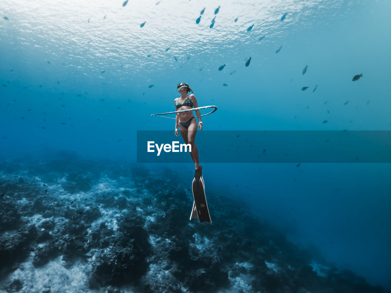 BOY SWIMMING IN SEA