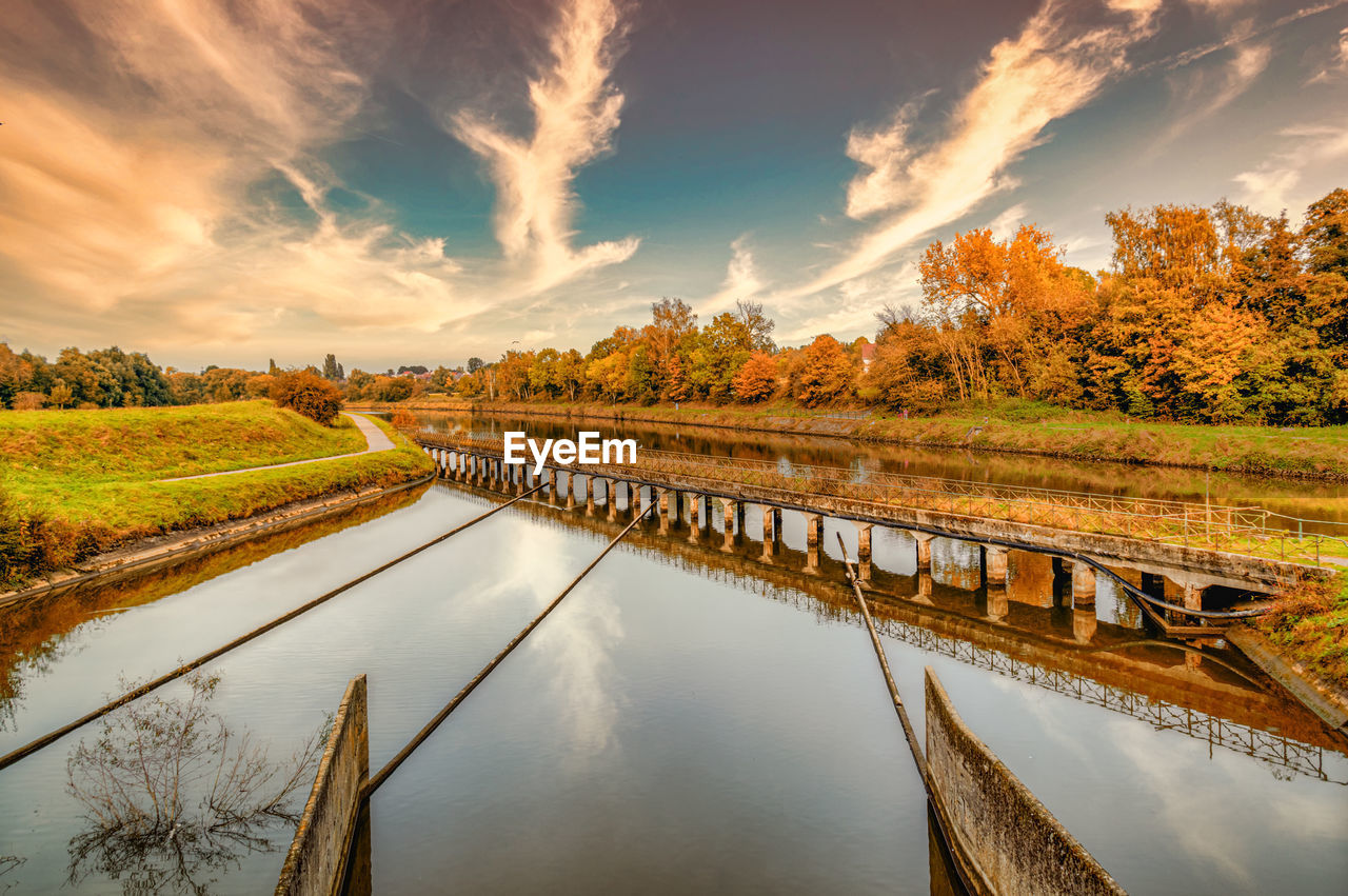 Brussels-charleroi canal leaving the lembeek lock at the end of the summer day.