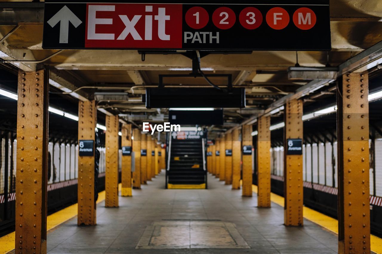 Exit sign on subway station platform