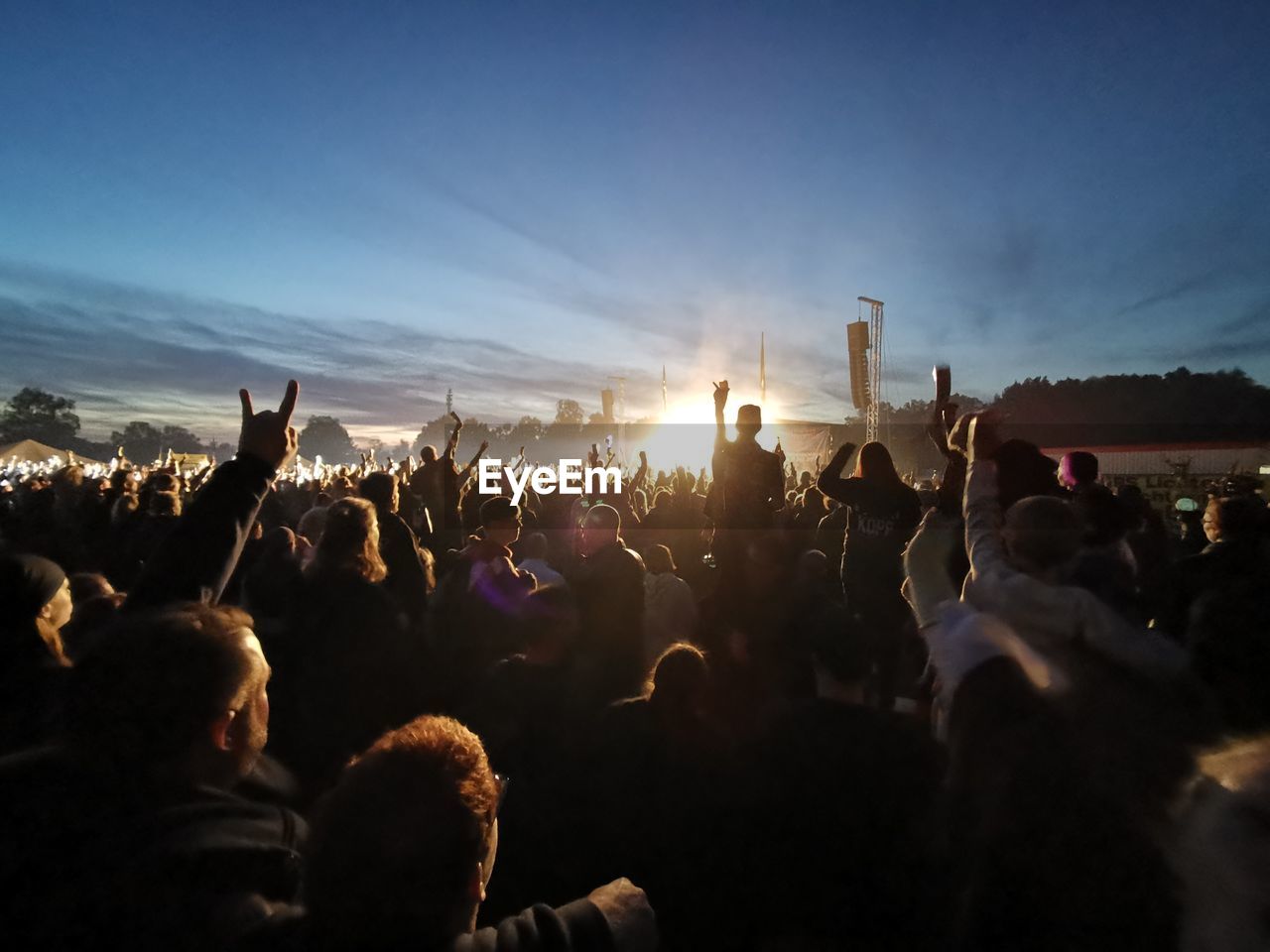 Crowd at concert during dusk