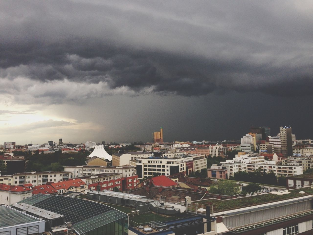 Storm cloud over city