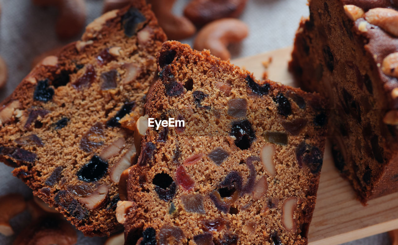 Sliced fruit cake with cashew nuts