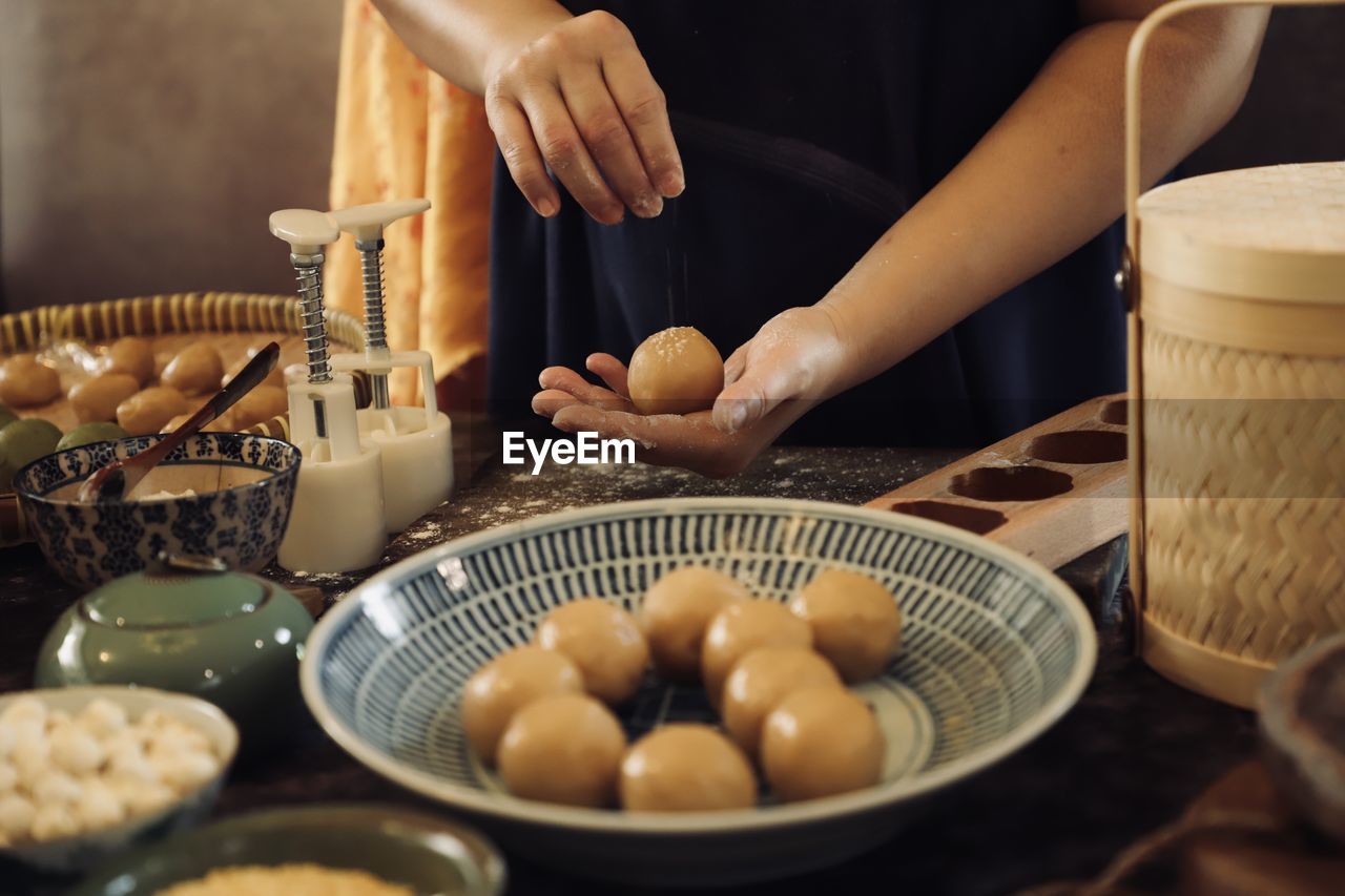 Making yue bing, the traditional baked mooncake
