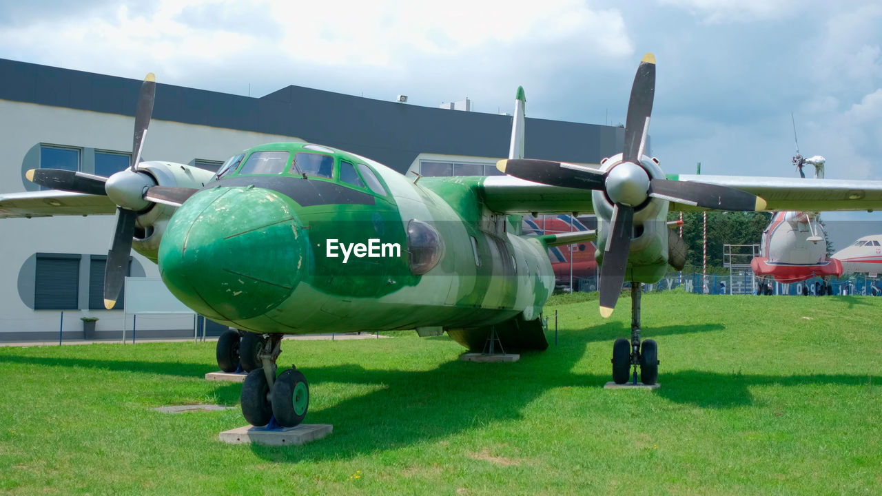 VIEW OF AIRPLANE AT AIRPORT