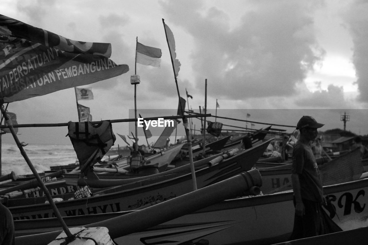 PANORAMIC VIEW OF HARBOR AGAINST SKY