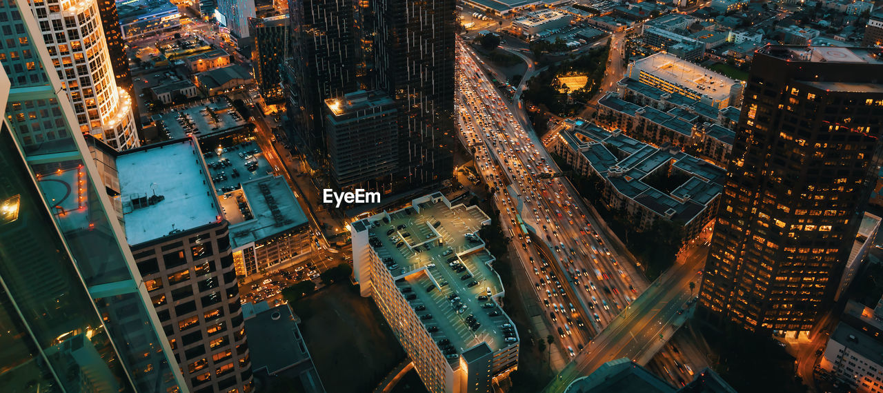 Aerial view of city buildings at night