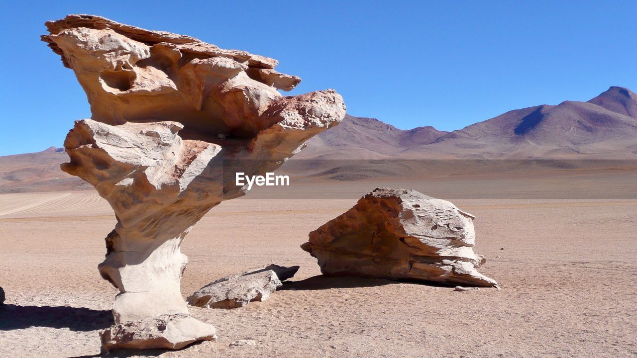 View of desert against clear sky