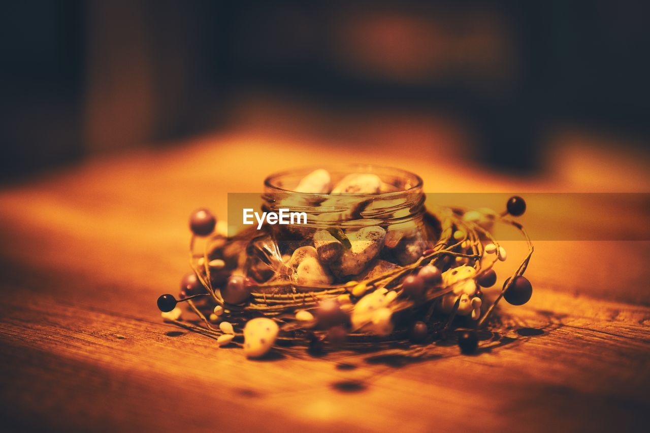 CLOSE-UP OF LEMON ON TABLE