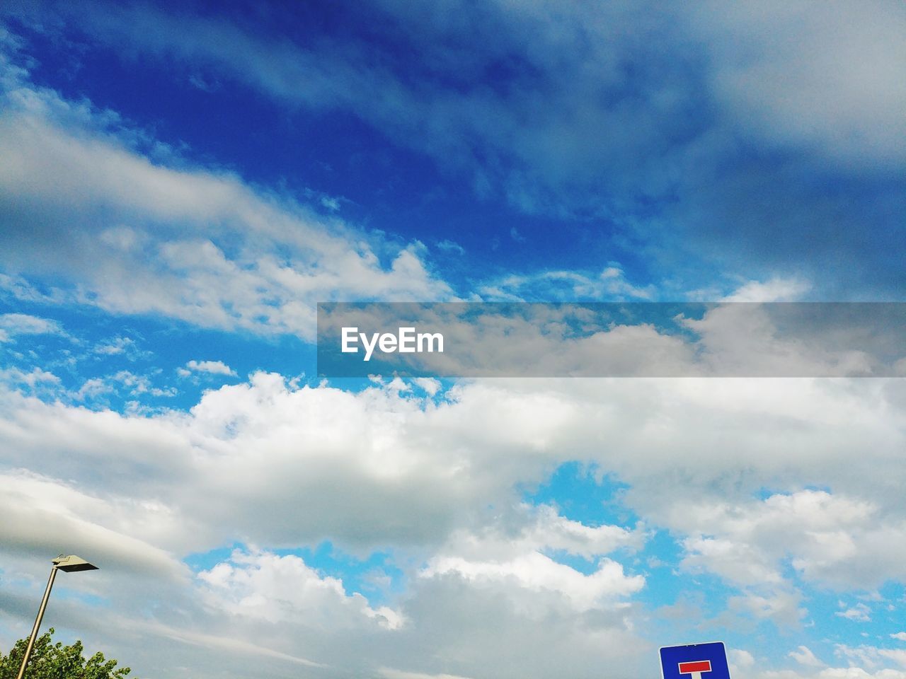 LOW ANGLE VIEW OF CLOUDY SKY OVER CLOUDS