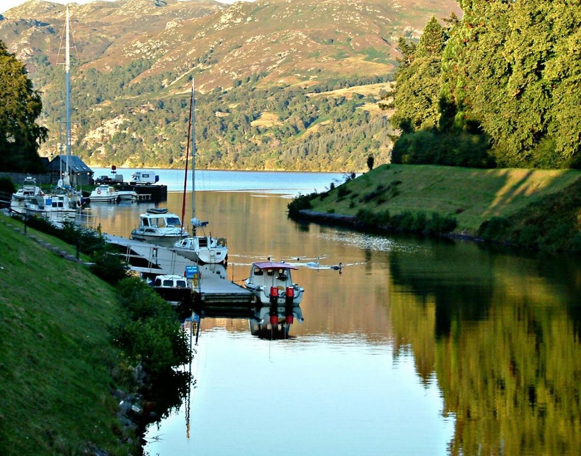 Scenic view of boats in river