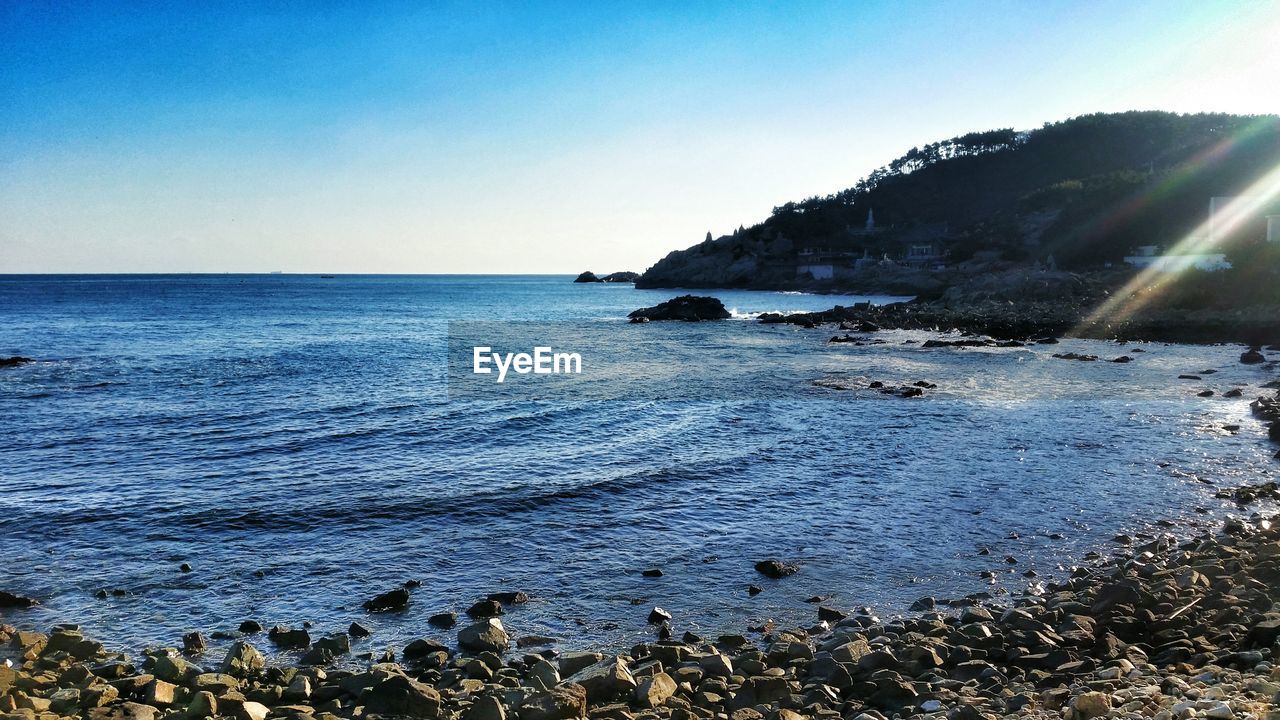 Scenic view of sea against clear sky