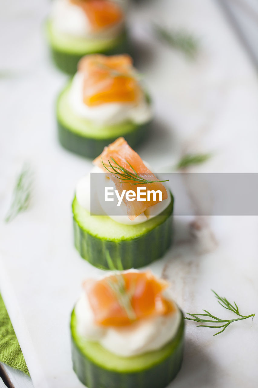 CLOSE-UP OF SUSHI ON TABLE