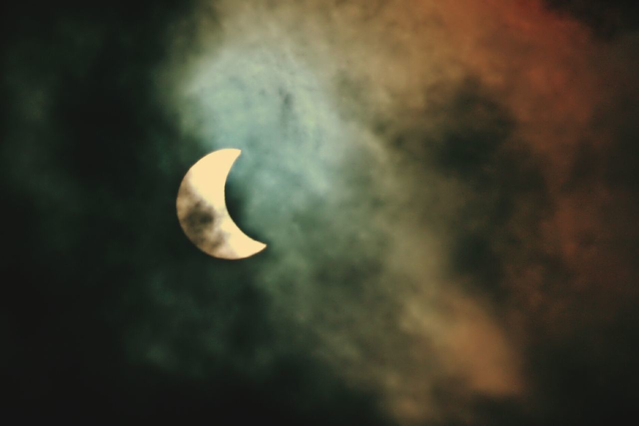 LOW ANGLE VIEW OF MOON AGAINST SKY AT NIGHT