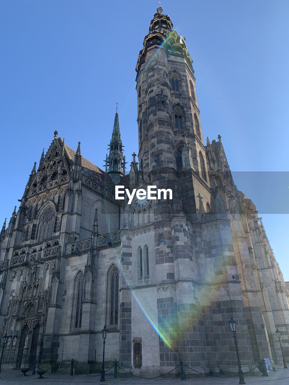 landmark, architecture, sky, nature, terrain, travel destinations, built structure, blue, history, travel, no people, the past, outdoors, building exterior, day, clear sky, city, sculpture, low angle view, vehicle, building, tower