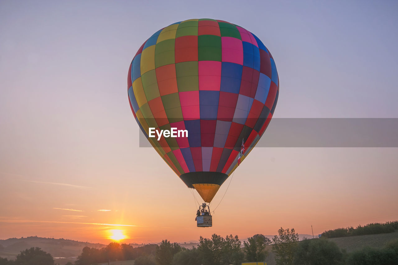 Beautiful hot air balloon flying at the sunrise